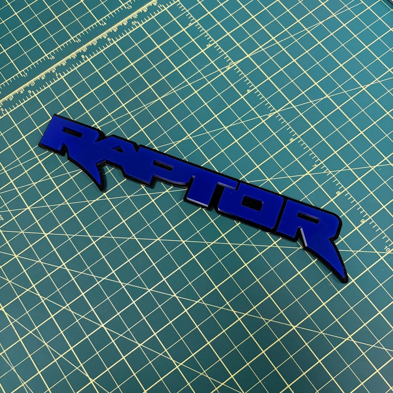 Load image into Gallery viewer, Raptor Emblem in Blue on green mat
